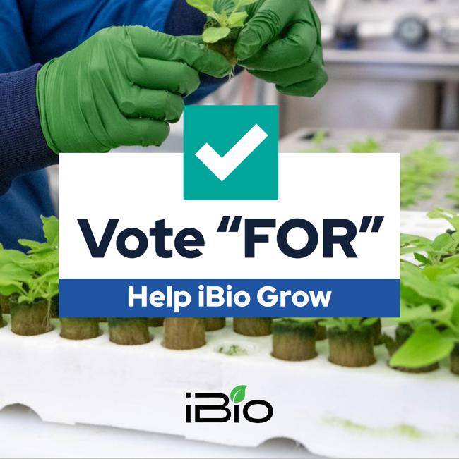 A picture containing text, person, sign, green
Description automatically generated